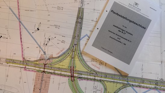 Ein Planfeststellungsbeschluss auf einem Plan