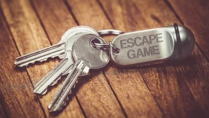 Schlüsselbund mit einem Anhänger beschriftet mit Escapegame
